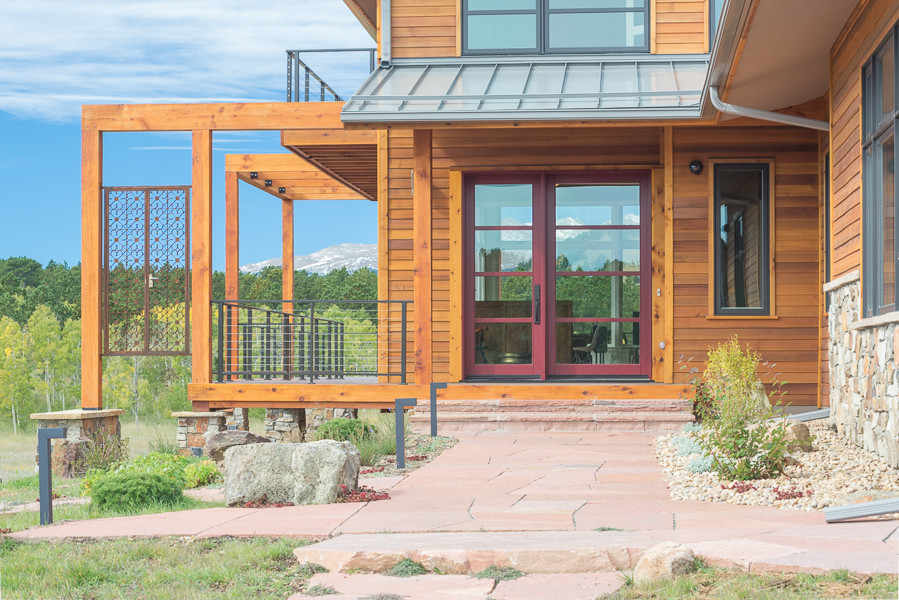 Inspiration for a rustic entryway remodel in Denver