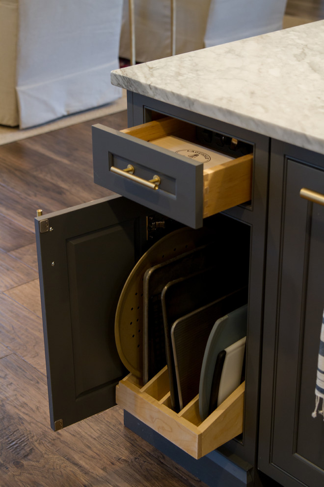 Eat-in kitchen - transitional medium tone wood floor and brown floor eat-in kitchen idea with beaded inset cabinets, gray cabinets, white backsplash, paneled appliances, an island and white countertops