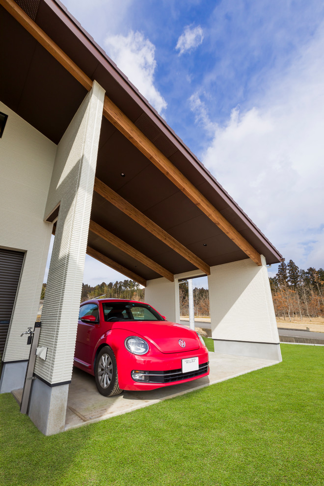 This is an example of a modern attached garage in Other.