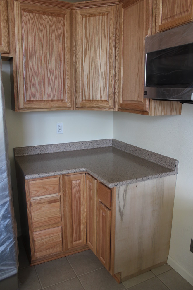 Inspiration for a timeless kitchen remodel with solid surface countertops