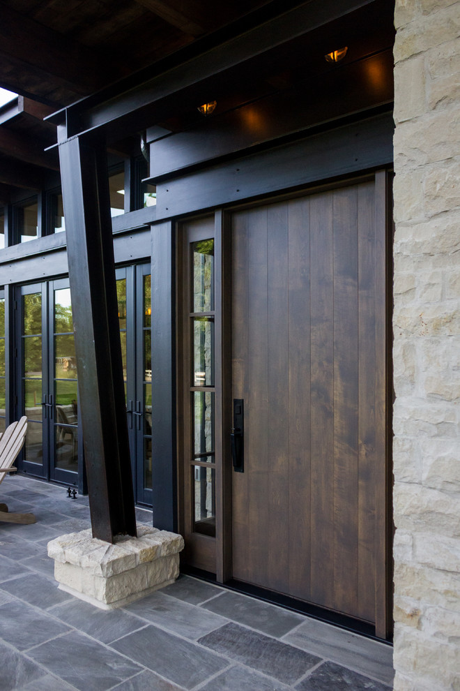 Mid-sized modern front door in Denver with a single front door and a dark wood front door.