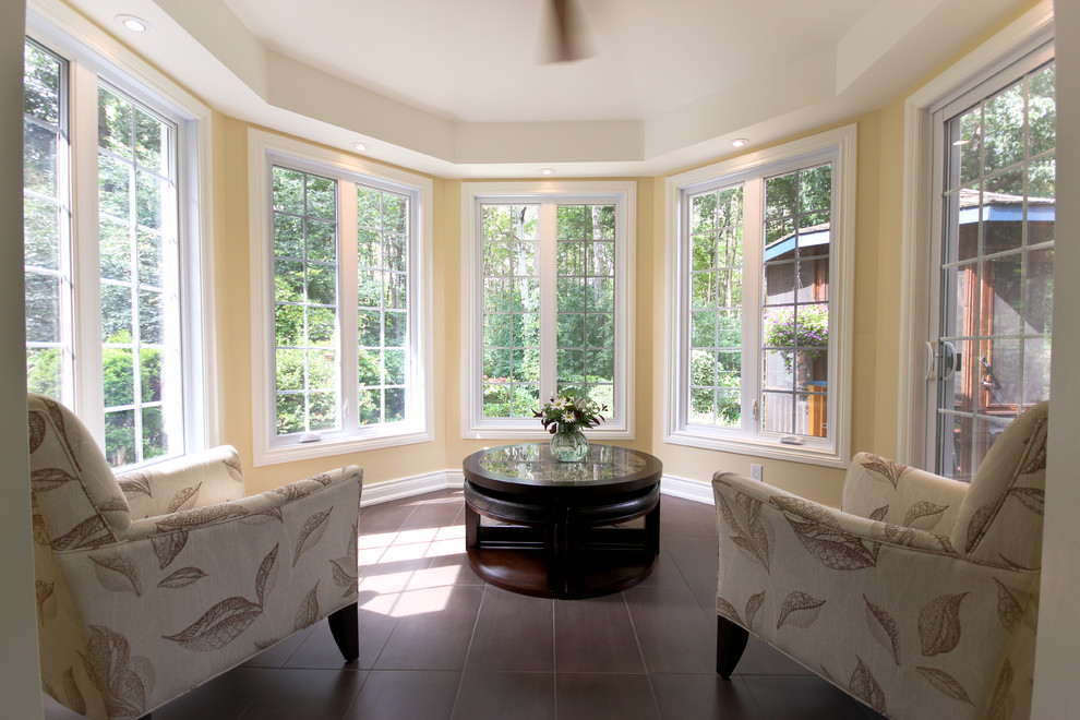 Photo of a mid-sized traditional sunroom in Ottawa with ceramic floors and no fireplace.