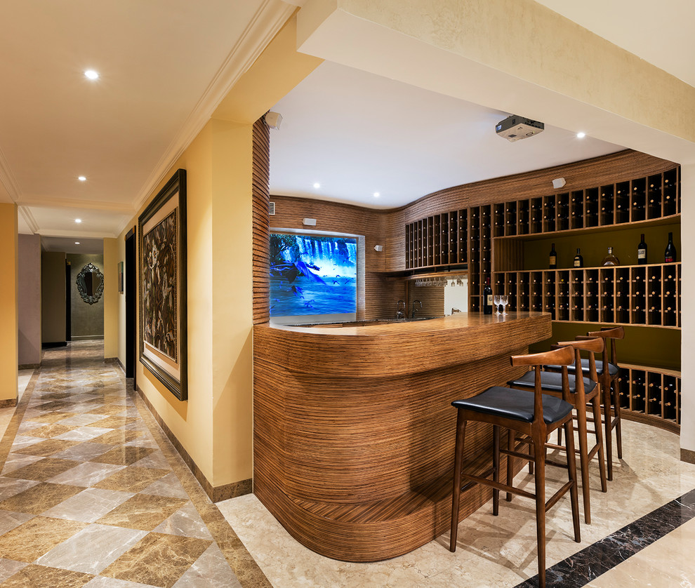 This is an example of a contemporary home bar in Bengaluru with wood benchtops, brown floor and brown benchtop.