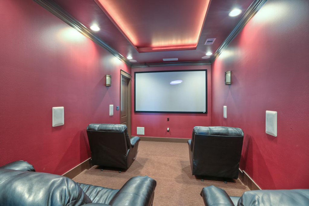 Design ideas for a mid-sized contemporary enclosed home theatre in Houston with red walls, carpet and a built-in media wall.
