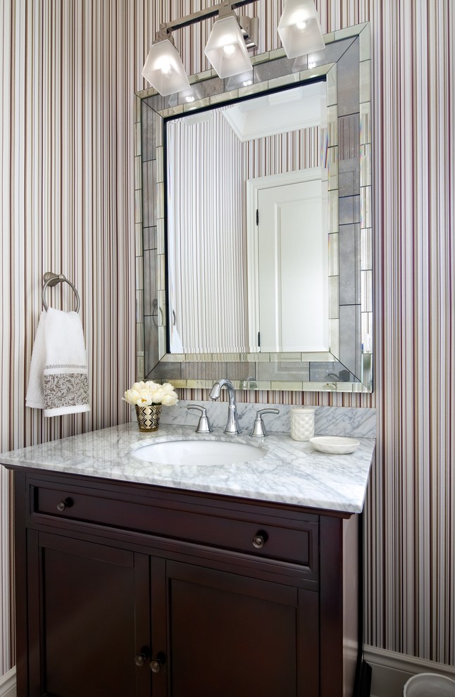 Design ideas for a transitional powder room in Toronto.