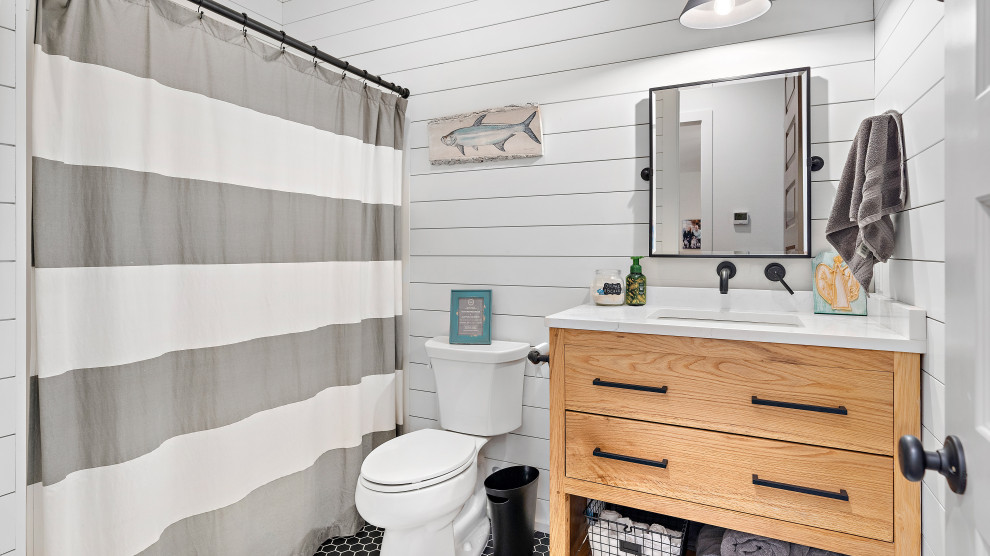 This is an example of a beach style bathroom in New Orleans.