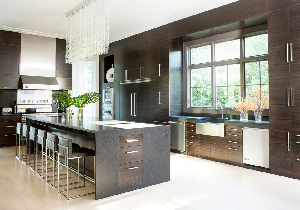 This is an example of a contemporary kitchen in Atlanta with a farmhouse sink and stainless steel appliances.