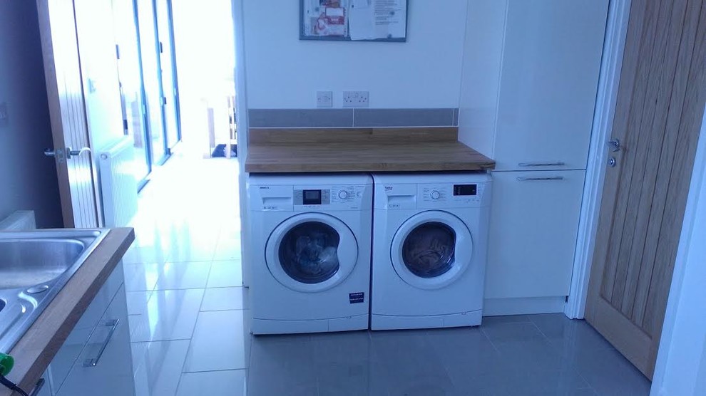 Photo of a contemporary laundry room in Wiltshire.