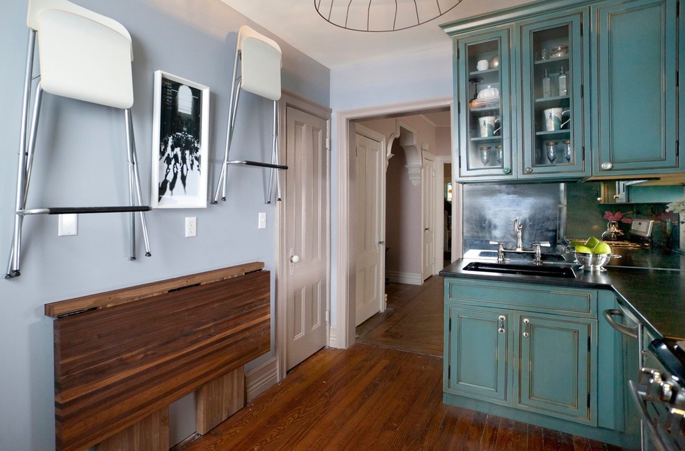Design ideas for an eclectic kitchen in New York with stainless steel appliances.