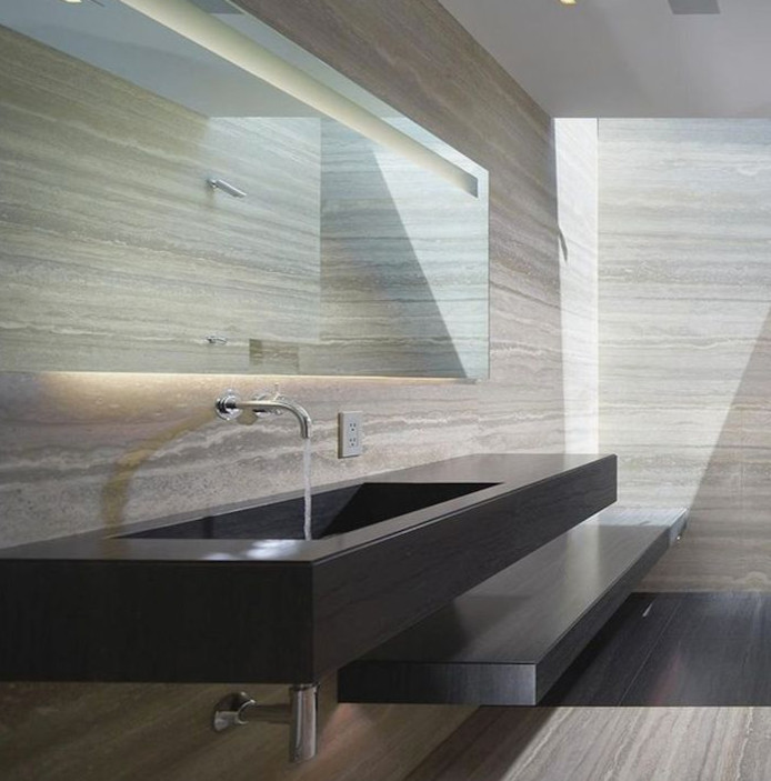 Large contemporary master bathroom in Toronto with open cabinets, dark wood cabinets, an open shower, gray tile, stone slab, grey walls, light hardwood floors, a trough sink, wood benchtops, grey floor and an open shower.