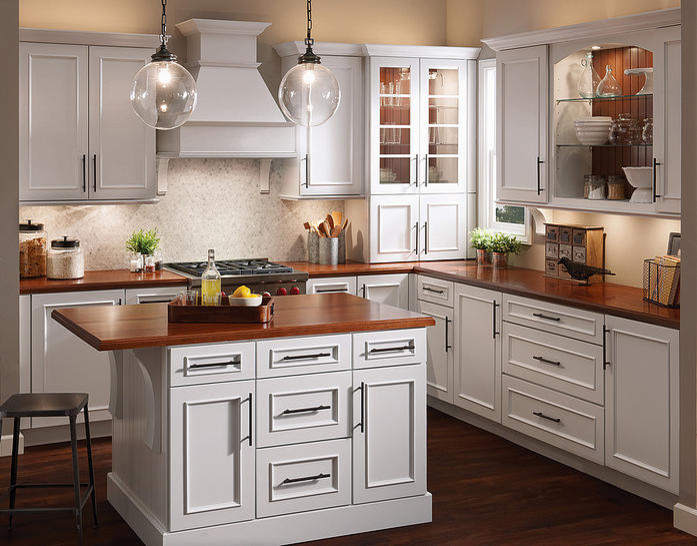 Inspiration for a mid-sized contemporary l-shaped kitchen in Orlando with beaded inset cabinets, white cabinets, stainless steel appliances, dark hardwood floors, with island and brown floor.