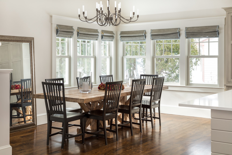 Inspiration for a transitional kitchen/dining combo in Boston with beige walls and dark hardwood floors.