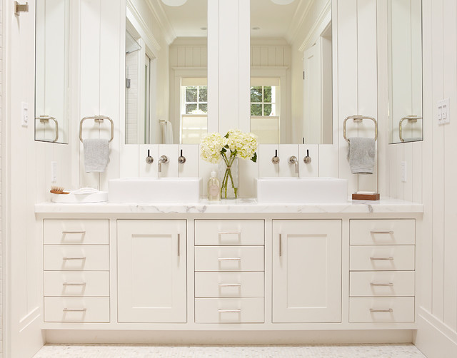 master bathroom, white vanity with two sinks and large mirrors