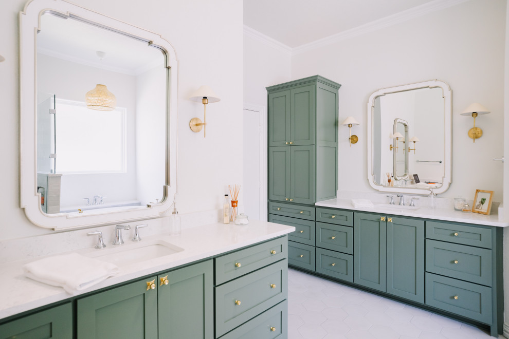 Идея дизайна: главная ванная комната среднего размера в современном стиле с зелеными фасадами, отдельно стоящей ванной, душем в нише, белой плиткой, белыми стенами, полом из керамической плитки, белым полом, тумбой под две раковины и встроенной тумбой