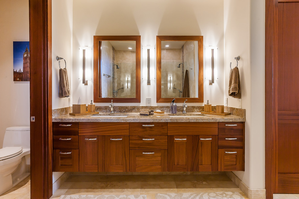 Design ideas for a large tropical bathroom in Hawaii with shaker cabinets, medium wood cabinets and marble benchtops.