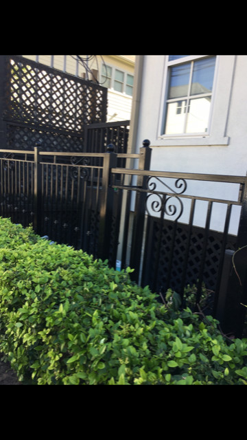 Wrought Iron Fence Renewed & Repainted.