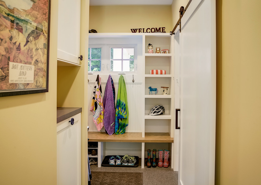Design ideas for a country mudroom in Other with yellow walls, linoleum floors, a single front door and a white front door.