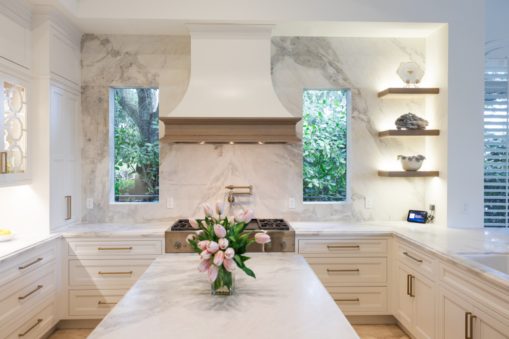 Inspiration for a transitional u-shaped kitchen remodel with an island