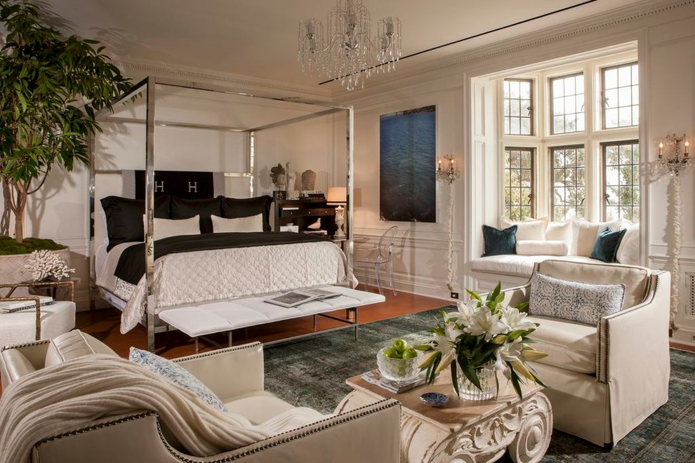 Design ideas for a large traditional bedroom in Los Angeles with white walls and dark hardwood floors.