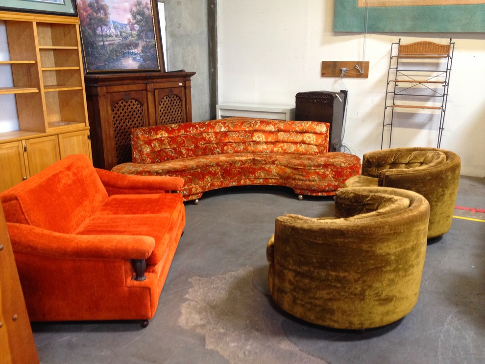 Large mid-century modern concrete floor living room photo in San Francisco with no fireplace