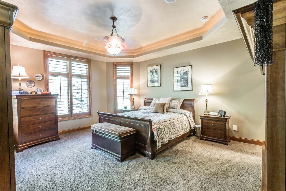 Example of a large classic bedroom design in Tampa