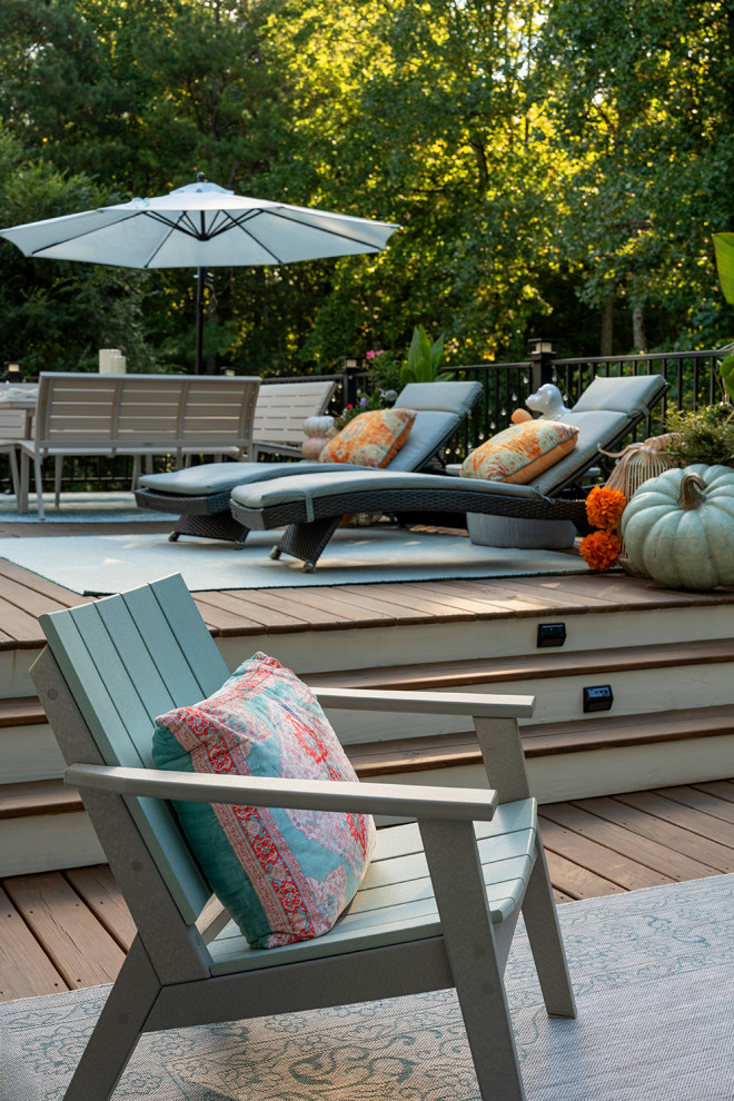 Inspiration for a huge transitional backyard second story metal railing deck remodel in Atlanta