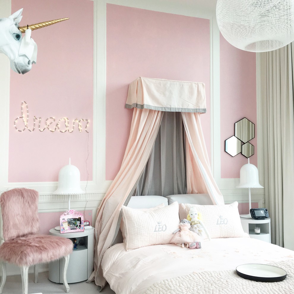 Photo of a small traditional bedroom in Toronto with pink walls, carpet and no fireplace.