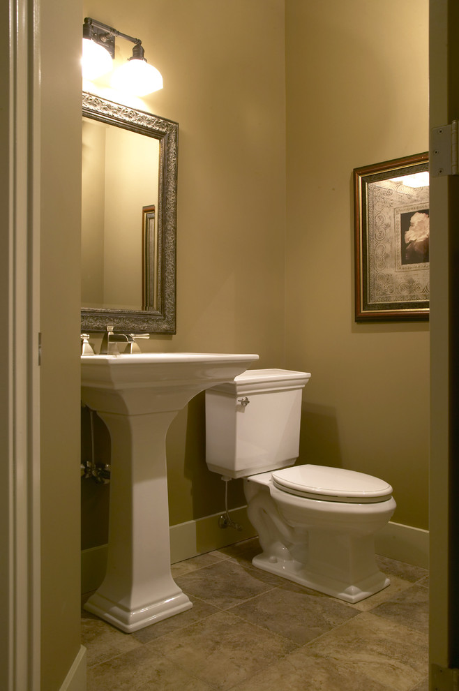 Design ideas for a traditional powder room in Calgary.