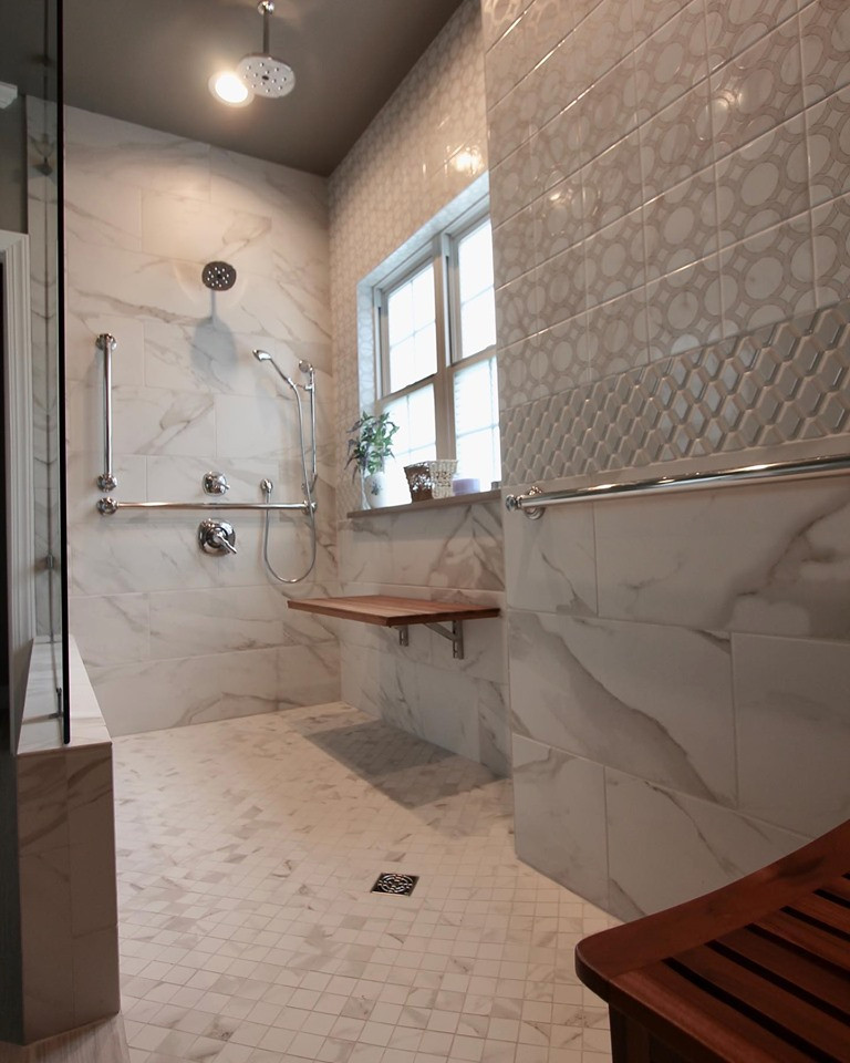 Doorless shower - large transitional master white tile and porcelain tile porcelain tile and gray floor doorless shower idea with shaker cabinets, gray cabinets, gray walls, an undermount sink, quartz countertops and white countertops