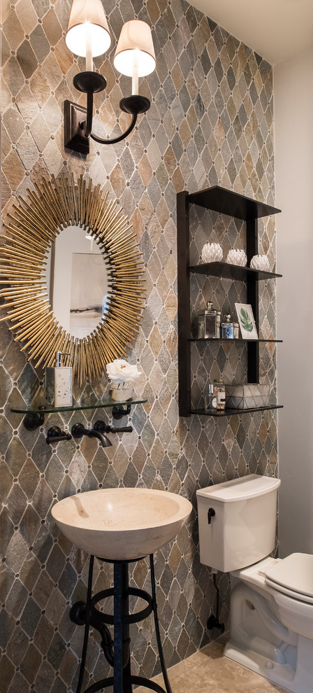 Transitional powder room in Orlando with multi-coloured tile and a console sink.