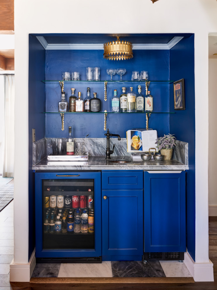 Photo of a transitional home bar in Phoenix.