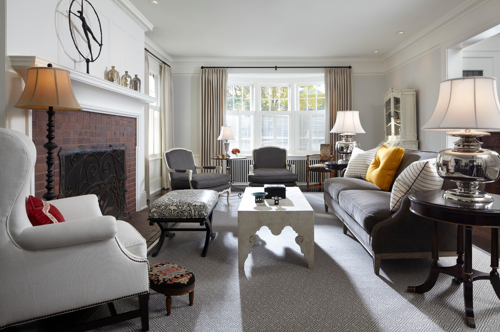 This is an example of a traditional living room in Minneapolis with white walls.