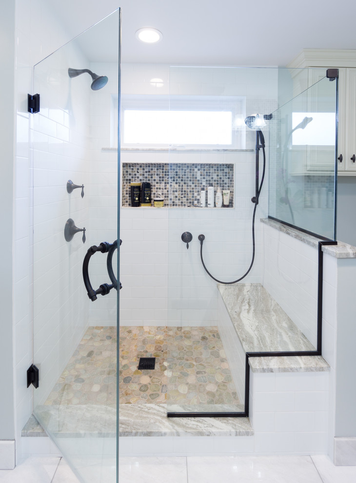 Design ideas for a large transitional master bathroom in Providence with recessed-panel cabinets, white cabinets, white tile, subway tile, an open shower, a two-piece toilet, an undermount sink, green walls, marble floors and a hinged shower door.