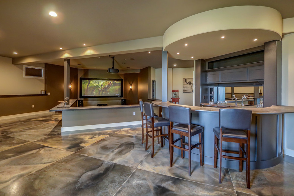 This is an example of a large contemporary galley seated home bar in Other with shaker cabinets, brown cabinets, concrete floors and multi-coloured floor.