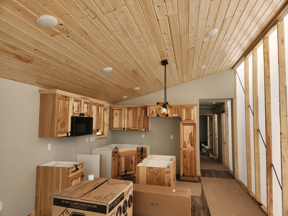Mountain style kitchen photo in Minneapolis with shaker cabinets