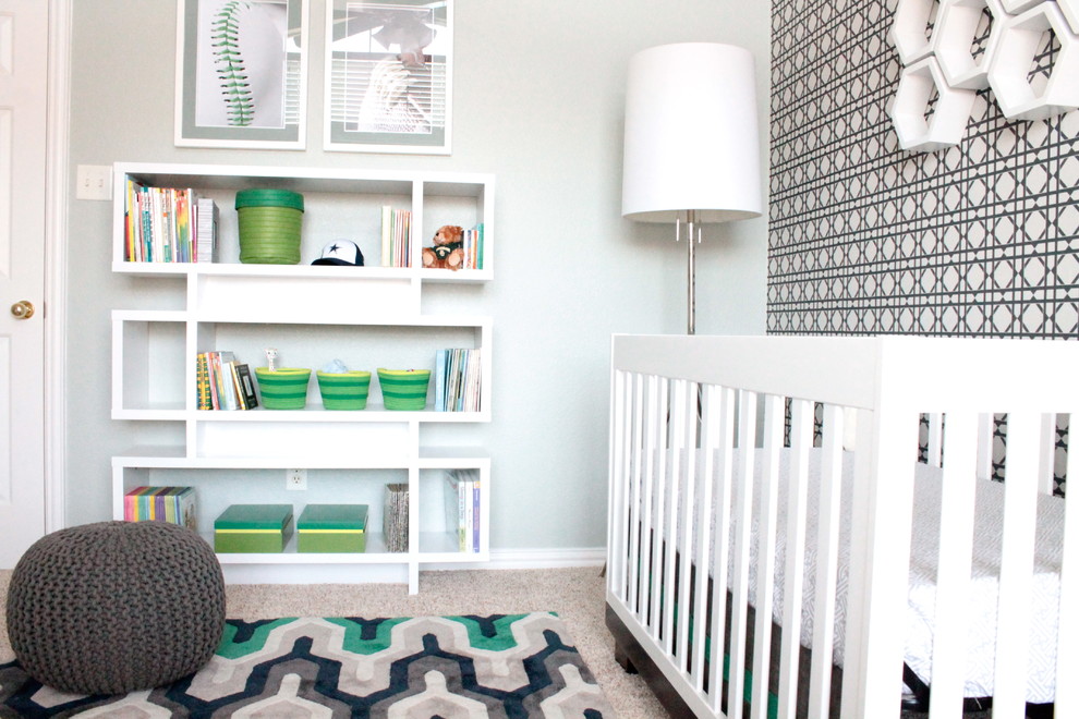 Photo of a mid-sized contemporary nursery for boys in Dallas with multi-coloured walls and carpet.
