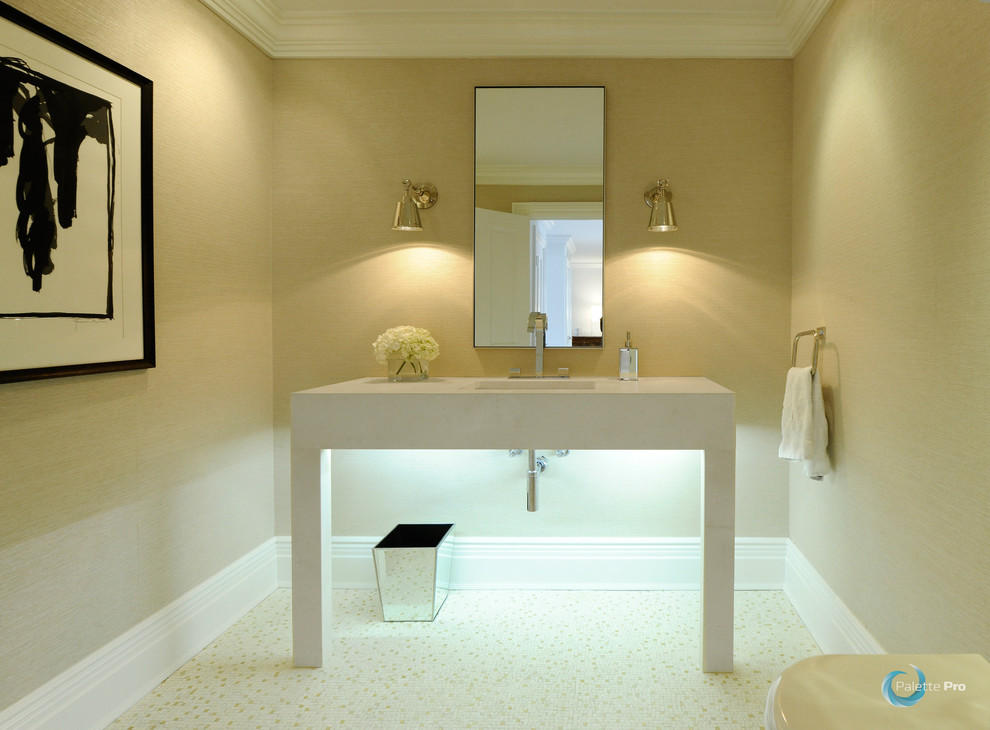 Example of a mid-sized minimalist white tile ceramic tile powder room design in New York with a console sink, furniture-like cabinets, white cabinets, a one-piece toilet and beige walls