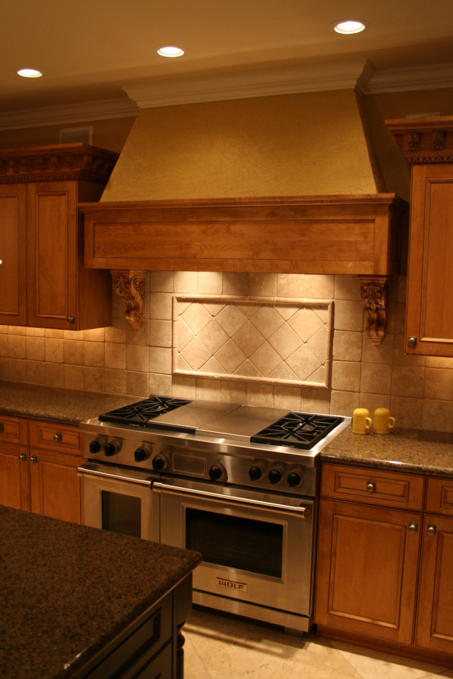 Example of a transitional kitchen design in Omaha