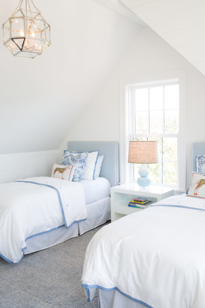 Design ideas for a large beach style guest bedroom in Boston with white walls.