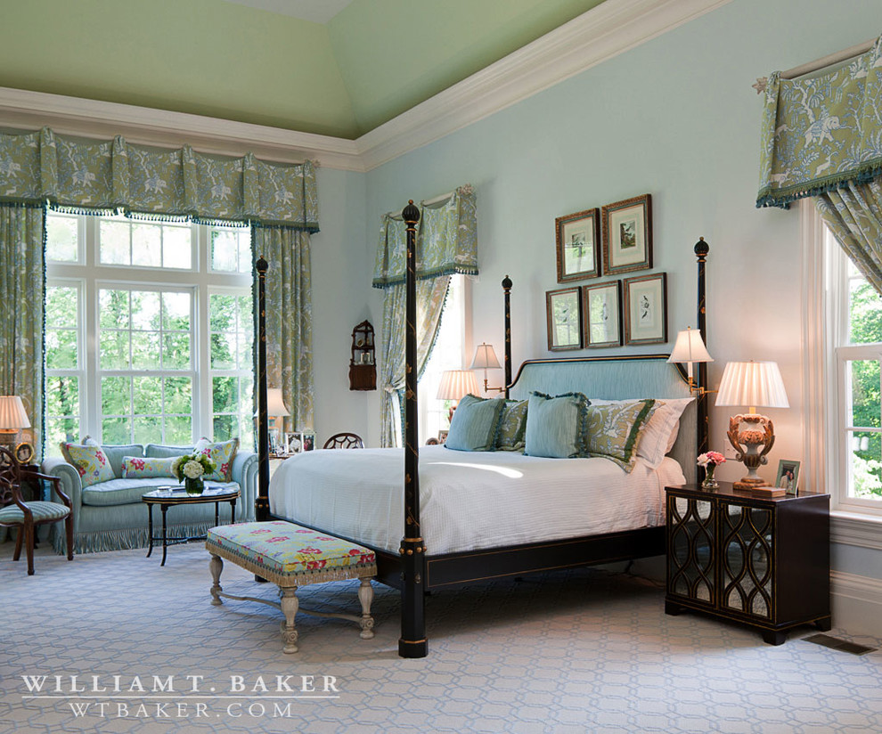 Design ideas for a large traditional master bedroom in Atlanta with green walls and dark hardwood floors.