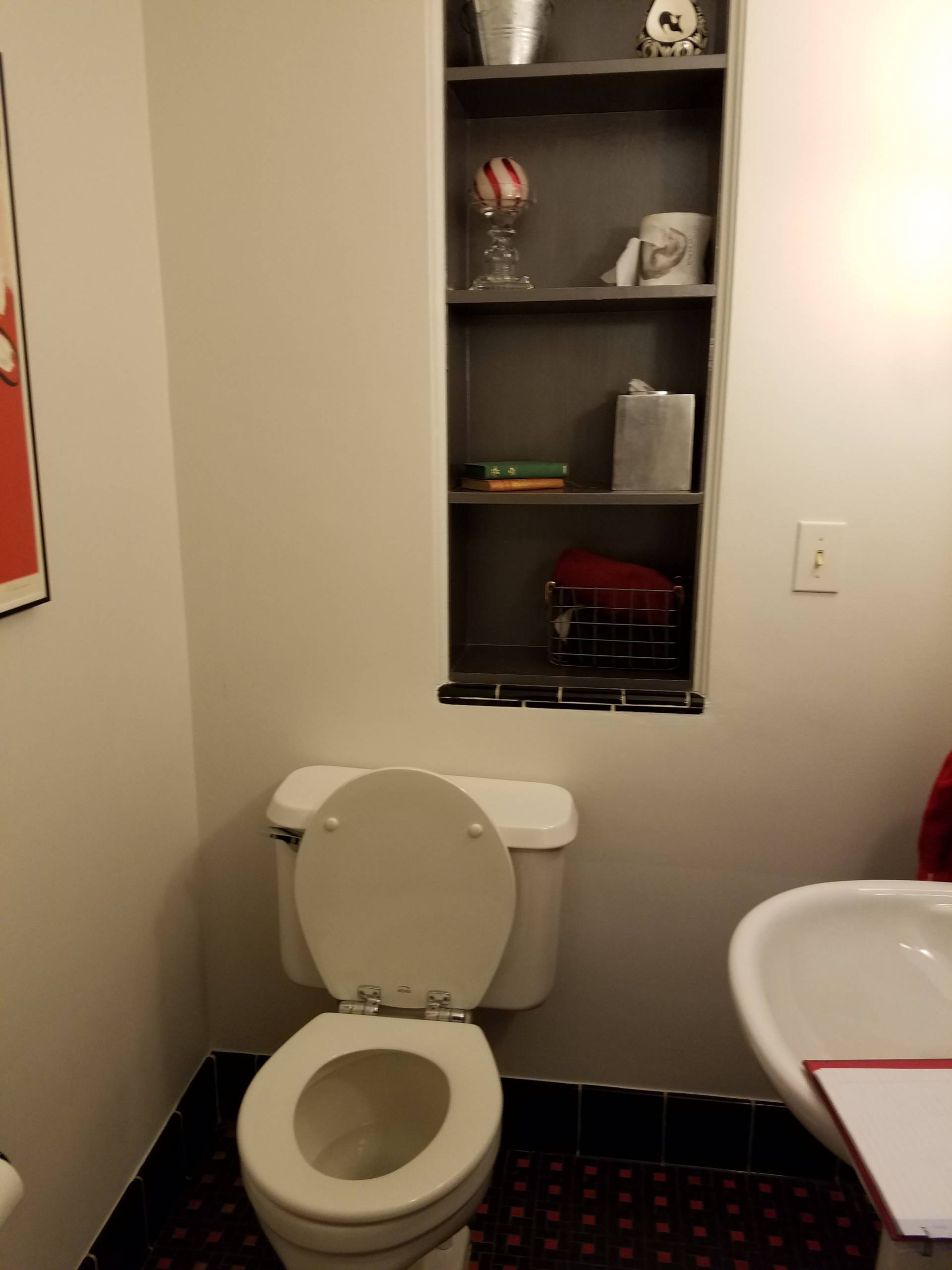 Wallpaper Install: Newsprint in Art Deco Powder Room