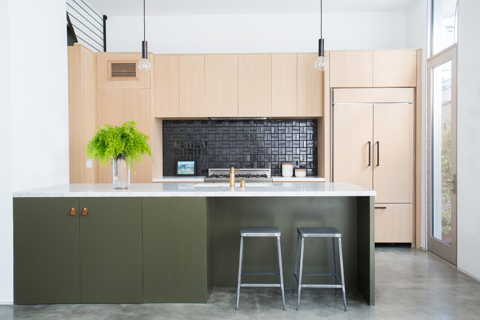 Design ideas for a mid-sized modern galley kitchen in Los Angeles with an undermount sink, flat-panel cabinets, light wood cabinets, quartz benchtops, ceramic splashback, panelled appliances, a peninsula, black splashback, concrete floors and grey floor.