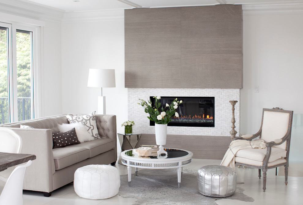 Design ideas for a contemporary living room in Vancouver with a tile fireplace surround.