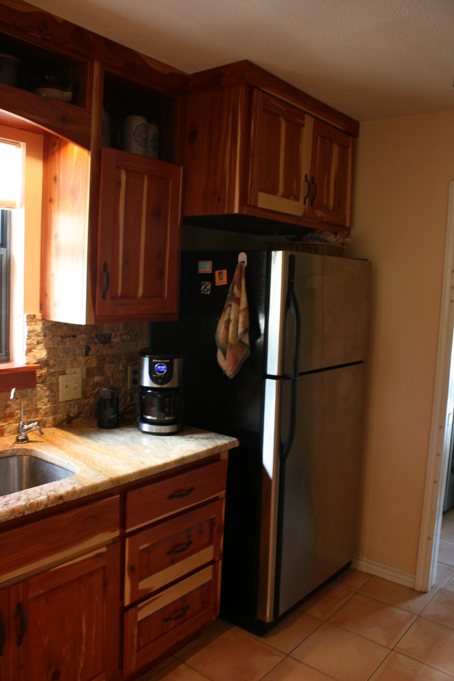 Inspiration for a rustic kitchen remodel in Austin