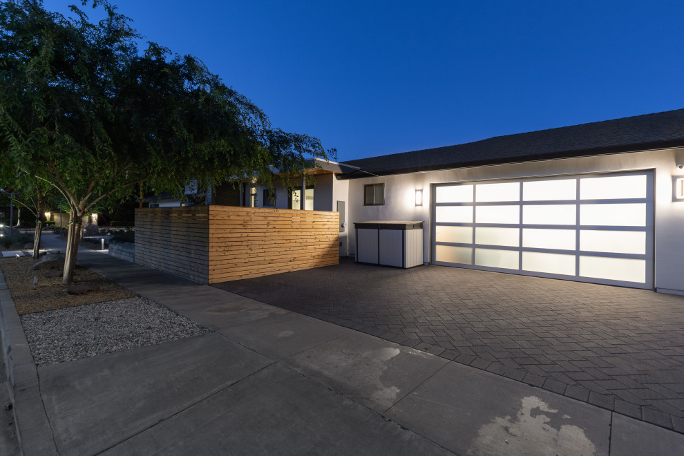 Design ideas for a mid-sized contemporary attached two-car garage in San Francisco.