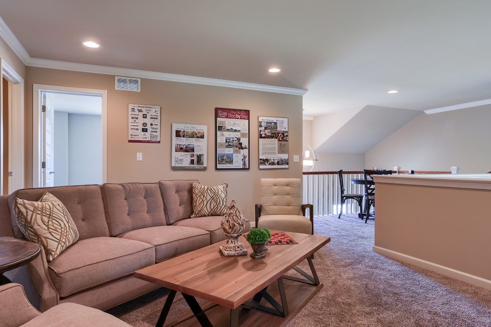 Example of a large transitional carpeted and beige floor hallway design with beige walls