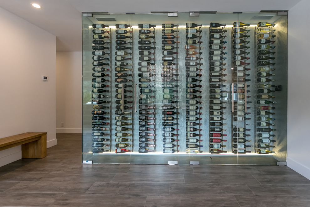 Photo of a contemporary wine cellar in Los Angeles.