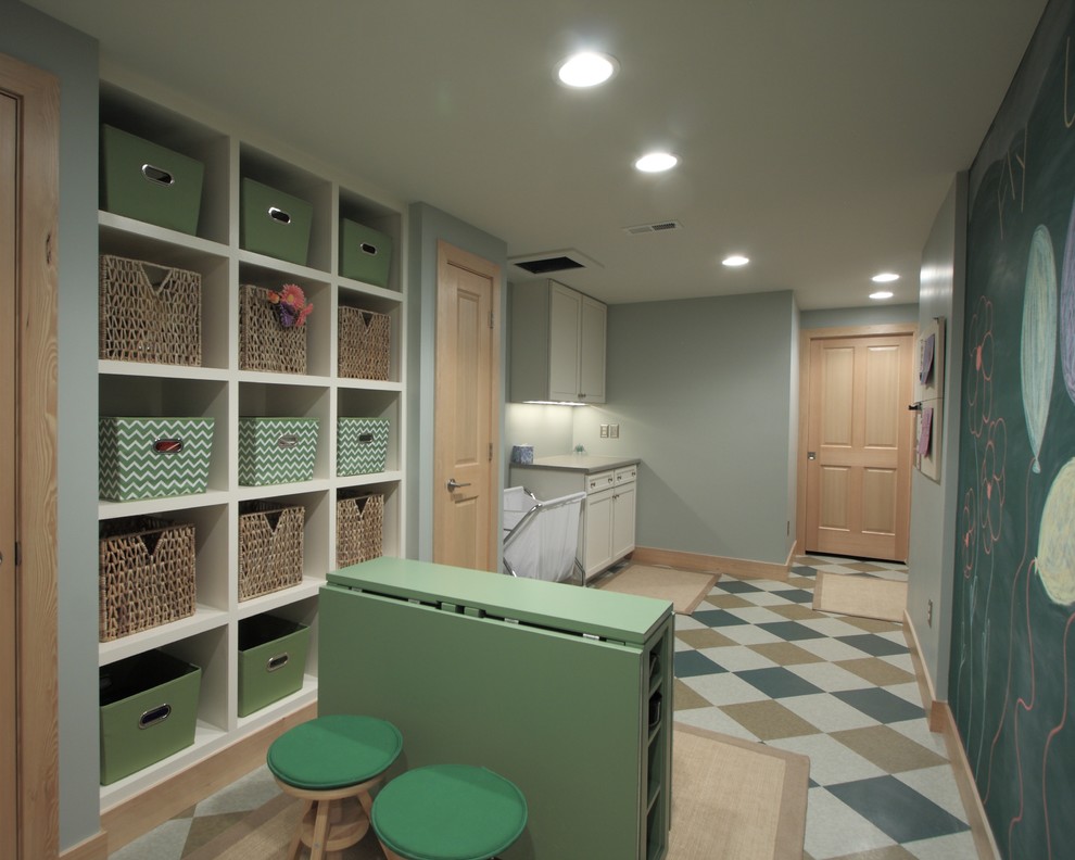 Traditional laundry room in Denver with open cabinets.