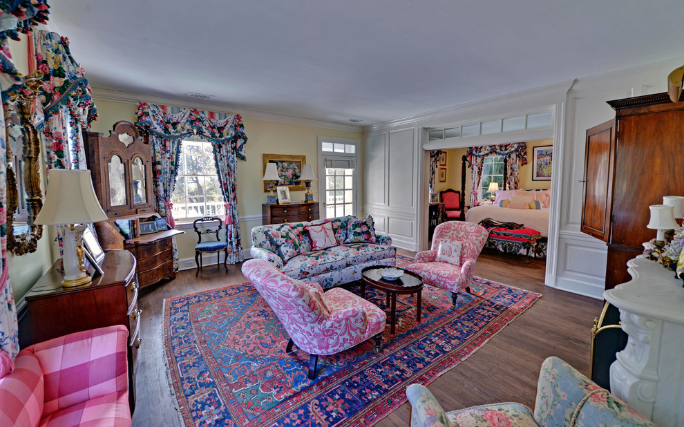 Example of a classic living room design in Atlanta with beige walls