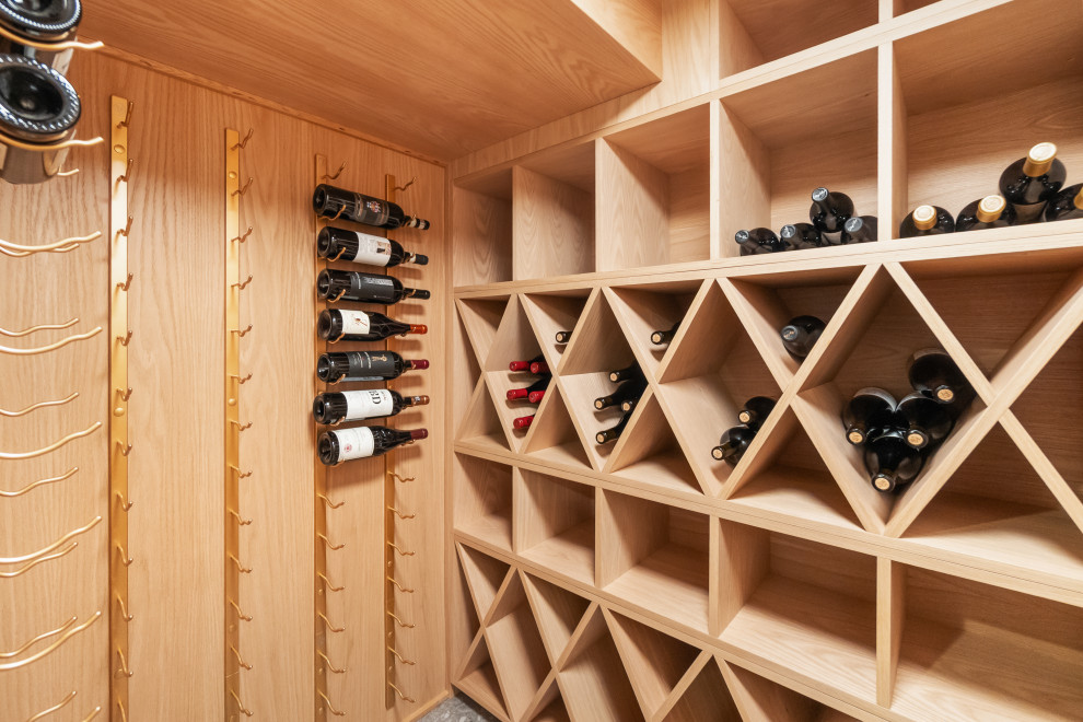Wine cellar - contemporary wine cellar idea in Denver